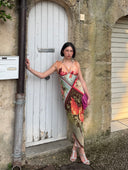Customer styling the Floral Patchwork Silk Dress SS 2001, featuring a vibrant patchwork floral motif, lightweight silk fabrication, and a flowing slip silhouette.