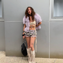 @aribrochin in the Taottao multi plaid chiffon skirt and patched fur jacket, styled for fashion week 