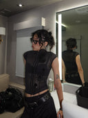 Customer wearing the Botany Mesh Top in Black by Fanci Club, a sheer black mesh top with an asymmetrical silhouette and layered botanical-inspired detailing, styled for a fashion-forward night out, concert, or editorial-inspired look.