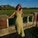 customer wearing the sabrina asym dress, styled for a summer wedding