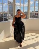 @anya.tisdale wearing the black bubble maxi dress for a day event